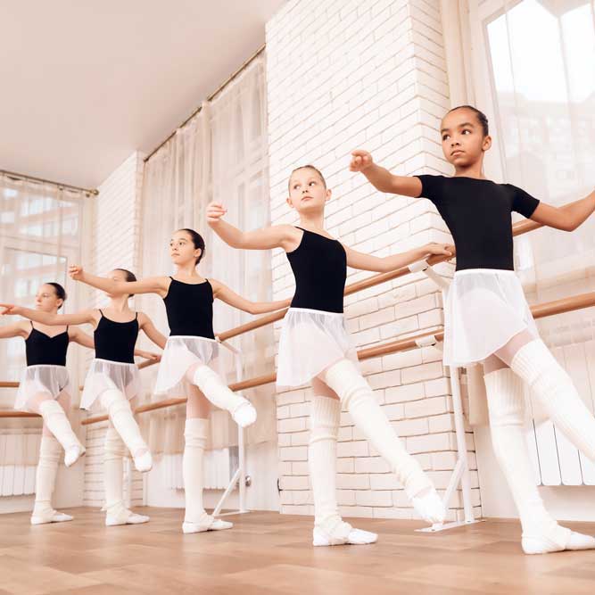ballet students at the barre